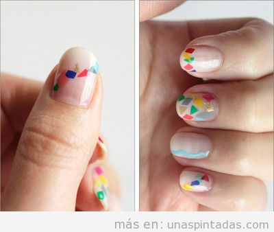 Decoración de uñas con triángulos de colores