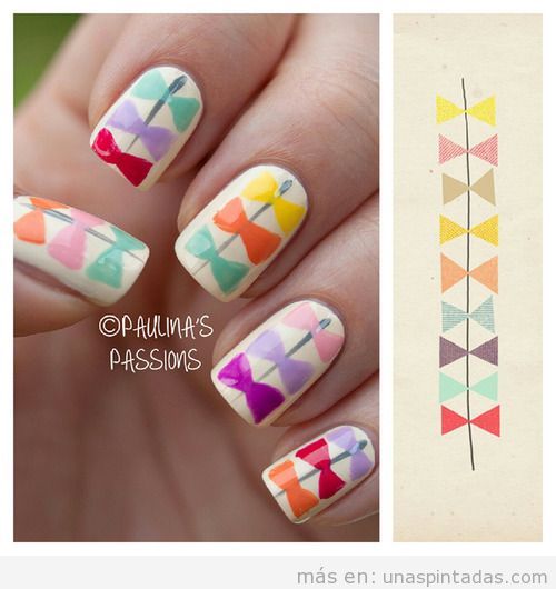 Diseño de uñas con lazos de colores en tonos pastel